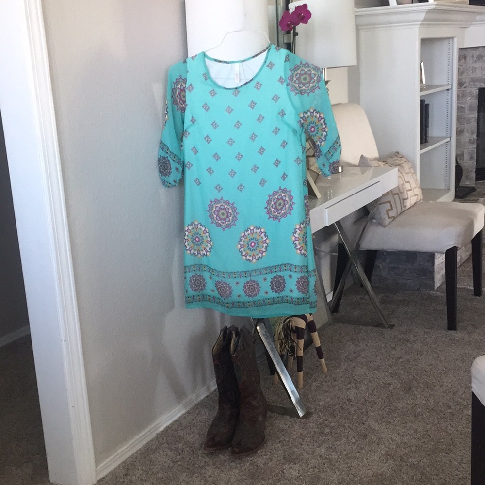 Three quarter sleeve light teal dress